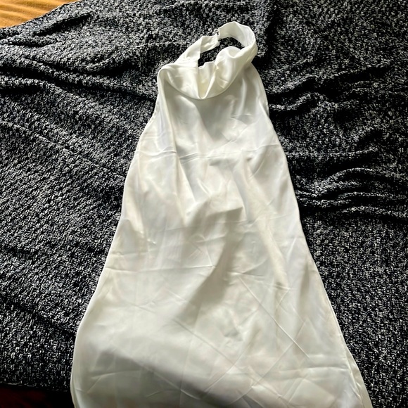 New mini white halter dress. Pearl like button details. Didn’t fit me. - Picture 1 of 3